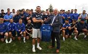 25 August 2022; Rónan Kelleher presents a jersey to Mullingar RFC President Connell Fitzgerald during day one of the Leinster Rugby 12 Counties Tour at Mullingar RFC in Westmeath. Photo by Harry Murphy/Sportsfile