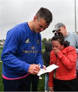 25 August 2022; Leinster supporter Amanda Butlerreacts as Jonathan Sexton signs a autograph during an open training session on day one of the Leinster Rugby 12 Counties Tour at Longford RFC in Longford. Photo by Harry Murphy/Sportsfile