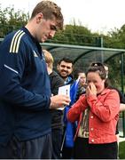25 August 2022; Charlie Ryan signs an autograph for Amanda Butler during an open training session on day one of the Leinster Rugby 12 Counties Tour at Longford RFC in Longford. Photo by Harry Murphy/Sportsfile