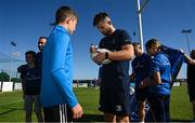 25 August 2022; Ross Byrne signs autographs after a training session on day one of the Leinster Rugby 12 Counties Tour at Ashbourne RFC in Ashbourne, Meath. Photo by Brendan Moran/Sportsfile