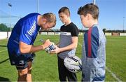 25 August 2022; Ross Molony signs autographs after a training session on day one of the Leinster Rugby 12 Counties Tour at Ashbourne RFC in Ashbourne, Meath. Photo by Brendan Moran/Sportsfile