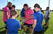 25 August 2022; Ed Byrne signs autographs after a training session on day one of the Leinster Rugby 12 Counties Tour at Ashbourne RFC in Ashbourne, Meath. Photo by Brendan Moran/Sportsfile
