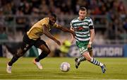 25 August 2022; Ronan Finn of Shamrock Rovers in action against Anderson Esiti of Ferencváros during the UEFA Europa League Play-Off Second Leg match between Shamrock Rovers and Ferencvaros at Tallaght Stadium in Dublin. Photo by Seb Daly/Sportsfile