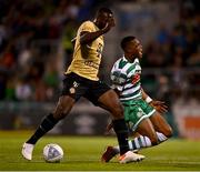 25 August 2022; Aidomo Emakhu of Shamrock Rovers is tackled by Anderson Esiti of Ferencváros during the UEFA Europa League Play-Off Second Leg match between Shamrock Rovers and Ferencvaros at Tallaght Stadium in Dublin. Photo by Eóin Noonan/Sportsfile