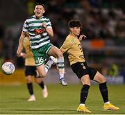 25 August 2022; Gary O'Neill of Shamrock Rovers is tackled by Krisztián Lisztes of Ferencváros during the UEFA Europa League Play-Off Second Leg match between Shamrock Rovers and Ferencvaros at Tallaght Stadium in Dublin. Photo by Seb Daly/Sportsfile