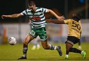 25 August 2022; Neil Farrugia of Shamrock Rovers in action against Marquinhos of Ferencváros during the UEFA Europa League Play-Off Second Leg match between Shamrock Rovers and Ferencvaros at Tallaght Stadium in Dublin. Photo by Eóin Noonan/Sportsfile