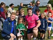 26 August 2022; James Tracy, left, and Joe McCarthy with supporters at an open training session on day two of the Leinster Rugby 12 Counties Tour at Kilkenny RFC in Kilkenny. Photo by Piaras Ó Mídheach/Sportsfile