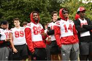 26 August 2022; Nebraska Cornhuskers players wait to go on stage during the pep-rally at Merrion Square in Dublin ahead of the the Aer Lingus College Football Classic 2022 match between Northwestern Wildcats and Nebraska Cornhuskers. Photo by David Fitzgerald/Sportsfile