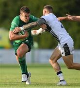 26 August 2022; Tom Farrell of Connacht is tackled by Sam Dugdale of Sale Sharks during the Pre-season Friendly match between Connacht and Sale Sharks at Dubarry Park in Athlone, Westmeath. Photo by Brendan Moran/Sportsfile