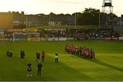 26 August 2022; Officials and players from both team during a minute's silence in memory of the late Derek 'Mono' Monoghan, Bohemians supporter and volunteer, and the late Des Casey, former president and honorary secretary of the Football Association of Ireland and former vice-president of UEFA, before the Extra.ie FAI Cup second round match between Lucan United and Bohemians at Dalymount Park in Dublin. Photo by Seb Daly/Sportsfile