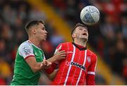 26 August 2022; Ryan Graydon of Derry City in action against Cian Coleman of Cork City during the Extra.ie FAI Cup second round match between Derry City and Cork City at the Ryan McBride Brandywell Stadium in Derry. Photo by Ramsey Cardy/Sportsfile