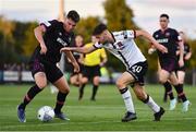 26 August 2022; Joe Adams of Dundalk in action against Paul Cleary of Wexford during the Extra.ie FAI Cup second round match between Wexford and Dundalk at Ferrycarrig Park in Wexford. Photo by Ben McShane/Sportsfile