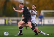 26 August 2022; Eoin Farrell of Wexford is tackled by Robbie McCourt of Dundalk during the Extra.ie FAI Cup second round match between Wexford and Dundalk at Ferrycarrig Park in Wexford. Photo by Ben McShane/Sportsfile