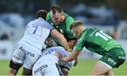 26 August 2022; Peter Dooley of Connacht is tackled by Ben Curry and Daniel du Preez of Sale Sharks during the Pre-season Friendly match between Connacht and Sale Sharks at Dubarry Park in Athlone, Westmeath. Photo by Brendan Moran/Sportsfile