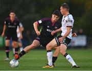26 August 2022; Luka Lovic of Wexford in action against David McMillan of Dundalk during the Extra.ie FAI Cup second round match between Wexford and Dundalk at Ferrycarrig Park in Wexford. Photo by Ben McShane/Sportsfile