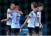 26 August 2022; David McMillan of Dundalk, left, celebrates with teammates after scoring their side's first goal during the Extra.ie FAI Cup second round match between Wexford and Dundalk at Ferrycarrig Park in Wexford. Photo by Ben McShane/Sportsfile