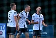 26 August 2022; David McMillan of Dundalk, centre, celebrates with teammates Lewis Macari, left, and Keith Ward after scoring their side's first goal during the Extra.ie FAI Cup second round match between Wexford and Dundalk at Ferrycarrig Park in Wexford. Photo by Ben McShane/Sportsfile