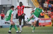 26 August 2022; James Akintunde of Derry City in action against Barry Coffey of Cork City during the Extra.ie FAI Cup second round match between Derry City and Cork City at the Ryan McBride Brandywell Stadium in Derry. Photo by Ramsey Cardy/Sportsfile