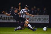 26 August 2022; Ryan O'Kane of Dundalk shoots to score his side's second goal despite the attention of Paul Cleary of Wexford during the Extra.ie FAI Cup second round match between Wexford and Dundalk at Ferrycarrig Park in Wexford. Photo by Ben McShane/Sportsfile