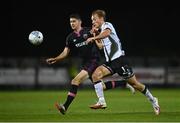 26 August 2022; Greg Sloggett of Dundalk in action against Harry Groome of Wexford during the Extra.ie FAI Cup second round match between Wexford and Dundalk at Ferrycarrig Park in Wexford. Photo by Ben McShane/Sportsfile