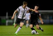 26 August 2022; John Martin of Dundalk in action against Len O'Sullivan of Wexford during the Extra.ie FAI Cup second round match between Wexford and Dundalk at Ferrycarrig Park in Wexford. Photo by Ben McShane/Sportsfile