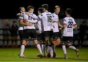 26 August 2022; Robbie Benson of Dundalk, left, celebrates with his teammates after scoring their side's third goal, a penalty, during the Extra.ie FAI Cup second round match between Wexford and Dundalk at Ferrycarrig Park in Wexford. Photo by Ben McShane/Sportsfile