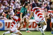 27 August 2022; Méabh Deely of Ireland is tackled by Komachi Imakugi of Japan during the Women's Rugby Summer Tour match between Japan and Ireland at Chichibunomiya Rugby Stadium in Tokyo, Japan. Photo by Tsutomu Takasu/Sportsfile