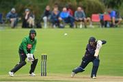27 August 2022; John Matchett of CIYMS and Lisburn wicketkeeper David Miller during the Clear Currency Irish Senior Cup Final match between Lisburn and CIYMS at Bready Cricket Club in Bready, Tyrone. Photo by Ramsey Cardy/Sportsfile