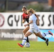 27 August 2022; Ellen Molloy of Wexford Youths in action against Chloe Darby of Bohemians during the SSE Airtricity Women's National League match between Bohemians and Wexford Youths at Dalymount Park in Dublin. Photo by Tyler Miller/Sportsfile
