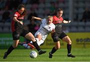 27 August 2022; Ellen Molloy of Wexford Youths is tackled by Lisa Murphy, left, and Isobel Finnegan, right, of Bohemians during the SSE Airtricity Women's National League match between Bohemians and Wexford Youths at Dalymount Park in Dublin. Photo by Tyler Miller/Sportsfile