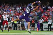 27 August 2022; Northwestern Wildcats wide receiver Donny Navarro III catches a touchdown pass during the Aer Lingus College Football Classic 2022 match between Northwestern Wildcats and Nebraska Cornhuskers at Aviva Stadium in Dublin. Photo by Brendan Moran/Sportsfile