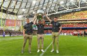 27 August 2022; All-Ireland winning Kerry footballers, from left, Darragh Roche, Michéal Burns and captain Séan O'Shea parade the Sam Maguire Cup during the Aer Lingus College Football Classic 2022 match between Northwestern Wildcats and Nebraska Cornhuskers at Aviva Stadium in Dublin. Photo by Brendan Moran/Sportsfile