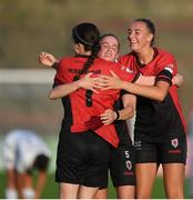27 August 2022; Kira Bates-Crosbie of Bohemians, left, celebrates with teammates Isobel Finnegan, centre, and Chloe Darby,right, after scoring her side's first goal during the SSE Airtricity Women's National League match between Bohemians and Wexford Youths at Dalymount Park in Dublin. Photo by Tyler Miller/Sportsfile