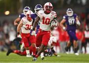 27 August 2022; Nebraska Cornhuskers running back Anthony Grant on his way to scoring his side's fourth touchdown during the Aer Lingus College Football Classic 2022 match between Northwestern Wildcats and Nebraska Cornhuskers at Aviva Stadium in Dublin. Photo by Ben McShane/Sportsfile