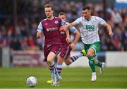 28 August 2022; Andrew Quinn of Drogheda United in action against Aaron Greene of Shamrock Rovers during the Extra.ie FAI Cup second round match between Drogheda United and Shamrock Rovers at Head in the Game Park in Drogheda, Louth. Photo by Ben McShane/Sportsfile
