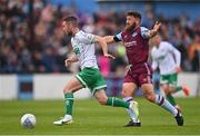 28 August 2022; Jack Byrne of Shamrock Rovers in action against Gary Deegan of Drogheda United during the Extra.ie FAI Cup second round match between Drogheda United and Shamrock Rovers at Head in the Game Park in Drogheda, Louth. Photo by Ben McShane/Sportsfile