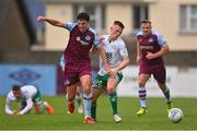 28 August 2022; Darragh Noone of Drogheda United in action against Andy Lyons of Shamrock Rovers during the Extra.ie FAI Cup second round match between Drogheda United and Shamrock Rovers at Head in the Game Park in Drogheda, Louth. Photo by Ben McShane/Sportsfile