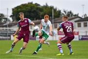 28 August 2022; Rory Gaffney of Shamrock Rovers in action against Andrew Quinn, left, and Georgie Poynton of Drogheda United during the Extra.ie FAI Cup second round match between Drogheda United and Shamrock Rovers at Head in the Game Park in Drogheda, Louth. Photo by Ben McShane/Sportsfile