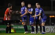 26 August 2022; Bohemians players, from left, Ciarán Kelly, Ethon Varian, Josh Kerr and Rory Feely during the Extra.ie FAI Cup second round match between Lucan United and Bohemians at Dalymount Park in Dublin. Photo by Seb Daly/Sportsfile