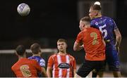 26 August 2022; Ciarán Kelly of Bohemians heads at goal, under pressure from Dylan Connolly of Lucan United, during the Extra.ie FAI Cup second round match between Lucan United and Bohemians at Dalymount Park in Dublin. Photo by Seb Daly/Sportsfile