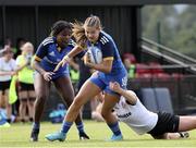 27 August 2022; Eva Sterritt of Leinster is tackled by Jessica Wilkinson of Ulster during the U18 Girls Interprovincial match between Ulster and Leinster at Newforge Country Club in Belfast. Photo by John Dickson/Sportsfile