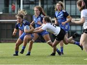 27 August 2022; Emma Brogan of Leinster is tackled by Ellie-Louise McCall of Ulster during the U18 Girls Interprovincial match between Ulster and Leinster at Newforge Country Club in Belfast. Photo by John Dickson/Sportsfile