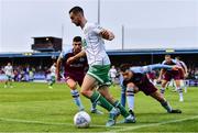 28 August 2022; Neil Farrugia of Shamrock Rovers in action against Luke Heeney, left, and Evan Weir of Drogheda United during the Extra.ie FAI Cup second round match between Drogheda United and Shamrock Rovers at Head in the Game Park in Drogheda, Louth. Photo by Ben McShane/Sportsfile