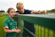 29 August 2022; FAI guest Zara Foley, age 10, from Ballinteer, Dublin, with manager Vera Pauw during a Republic of Ireland Women training session at the FAI National Training Centre in Abbotstown, Dublin. Photo by Stephen McCarthy/Sportsfile
