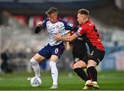 29 August 2022; Chris Forrester of St Patrick's Athletic in action against Ciarán Kelly of Bohemians during the SSE Airtricity League Premier Division match between Bohemians and St Patrick's Athletic at Dalymount Park in Dublin. Photo by Eóin Noonan/Sportsfile