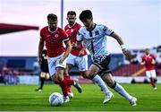29 August 2022; Ryan O'Kane of Dundalk in action against Greg Bolger of Sligo Rovers during the SSE Airtricity League Premier Division match between Sligo Rovers and Dundalk at The Showgrounds in Sligo. Photo by Ben McShane/Sportsfile