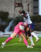 29 August 2022; Jon McCracken of Bohemians tussles with Serge Atakayi of St Patrick's Athletic during the SSE Airtricity League Premier Division match between Bohemians and St Patrick's Athletic at Dalymount Park in Dublin. Photo by Eóin Noonan/Sportsfile