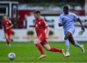 29 August 2022; Conor Kane of Shelbourne gets away from Sadou Diallo of Derry City during the SSE Airtricity League Premier Division match between Shelbourne and Derry City at Tolka Park in Dublin. Photo by Piaras Ó Mídheach/Sportsfile
