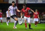 29 August 2022; Adam McDonnell of Sligo Rovers in action against Sam Bone of Dundalk during the SSE Airtricity League Premier Division match between Sligo Rovers and Dundalk at The Showgrounds in Sligo. Photo by Ben McShane/Sportsfile