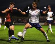 29 August 2022; Eoin Doyle of St Patrick's Athletic in action against Rory Feely of Bohemians during the SSE Airtricity League Premier Division match between Bohemians and St Patrick's Athletic at Dalymount Park in Dublin. Photo by Tyler Miller/Sportsfile